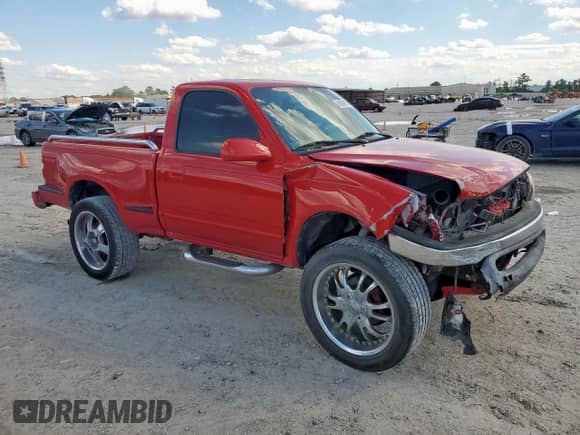 2004 Toyota Tacoma PreRunner with VIN 5TENM92N74Z464206, listed as a Copart auction lot 84038115 with 217,428 mi miles and Salvage title. Bid and sale history available at DreamBid. Image 4.