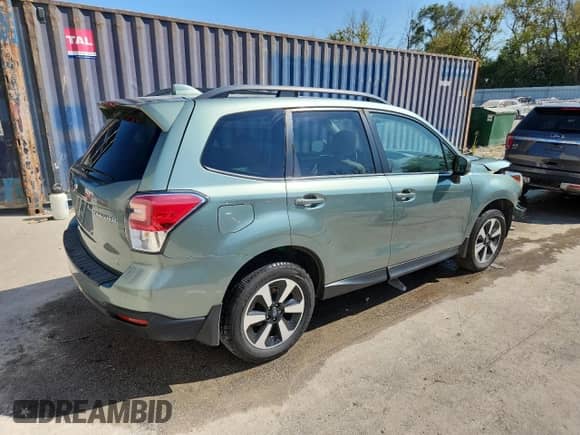 2018 Subaru Forester Premium z VIN JF2SJAECXJH568131, wystawiony jako Copart lot #81117215 z przebiegiem 86 856 mil mil oraz Szkoda całkowita • Salvage title. Historia ofert i sprzedaży dostępna na DreamBid. Obrazek 3.