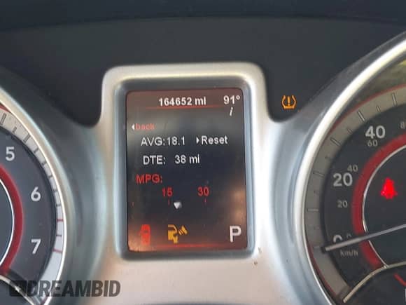 2012 Dodge Journey American Value z VIN 3C4PDCAB6CT389481, wystawiony jako IAAI lot #43359773 z przebiegiem 164 652 mil mil oraz . Historia ofert i sprzedaży dostępna na DreamBid. Obrazek 7.