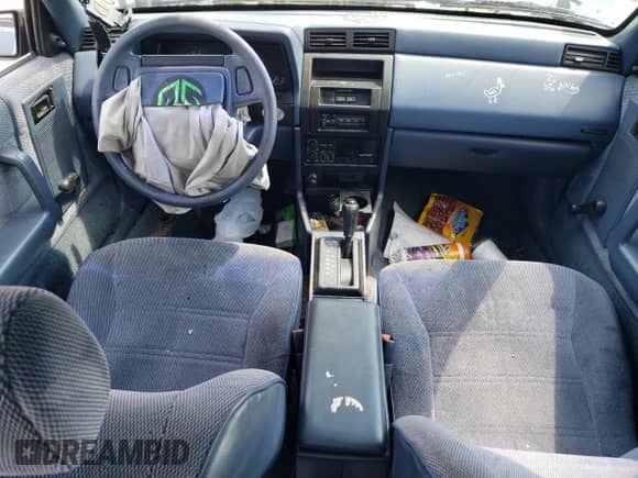 1992 Dodge Shadow with VIN 1B3XP48KXNN262238, listed as a Copart auction lot 61809755 with 108,984 mi miles and Clean title. Bid and sale history available at DreamBid. Image 8.