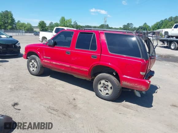 2004 Chevrolet Blazer LS with VIN 1GNDT13X44K113359, listed as a IAAI auction lot 42279143 with 137,260 mi miles and . Bid and sale history available at DreamBid. Image 3.