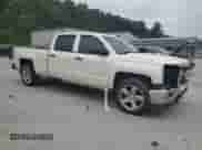 2014 Chevrolet Silverado 1500 LT с VIN 3GCUKREC6EG210320, выставлен на аукционе Copart как лот 66560185 с пробегом 198 219 миль миль и Списание • Salvage title. История ставок и продаж доступна на DreamBid. Изображение 4.