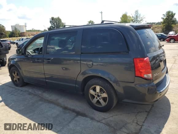 2012 Dodge Grand Caravan SXT with VIN 2C4RDGCG2CR264666, listed as a Copart auction lot 81803935 with 204,945 mi miles and Clean title. Bid and sale history available at DreamBid. Image 2.