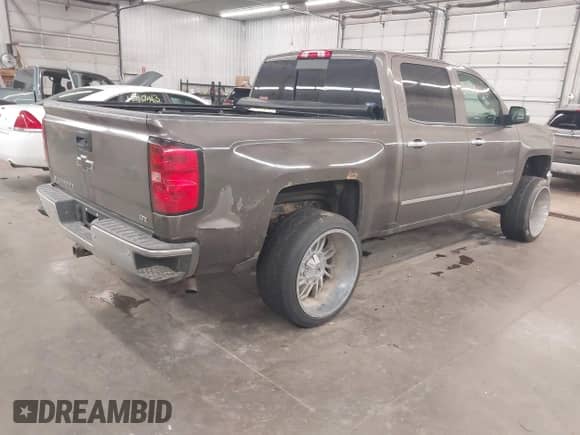 2014 Chevrolet Silverado 1500 LTZ with VIN 3GCUKSEC9EG225675, listed as a IAAI auction lot 42165845 with 139,417 mi miles and . Bid and sale history available at DreamBid. Image 4.