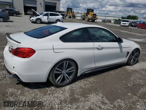 2017 BMW 4 Series 440i with VIN WBA4P1C51HK523020, listed as a Copart auction lot 56484595 with 202,207 mi miles and Salvage title. Bid and sale history available at DreamBid. Image 3.