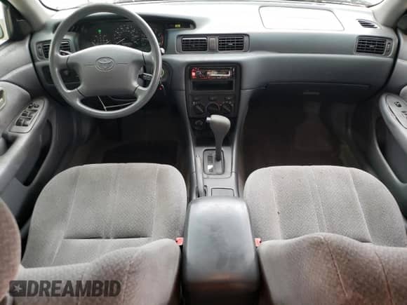 2000 Toyota Camry LE с VIN 4T1BF22K0YU099470, выставлен на аукционе Copart как лот 70028715 с пробегом 238 736 миль миль и Списание • Salvage title. История ставок и продаж доступна на DreamBid. Изображение 8.