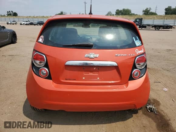 2012 Chevrolet Sonic LTZ с VIN 1G1JE6SH8C4152982, выставлен на аукционе Copart как лот 69071965 с пробегом 181 086 миль миль и Чистый • Clean title. История ставок и продаж доступна на DreamBid. Изображение 6.