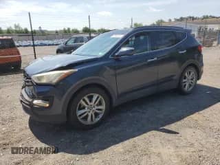 2014 Hyundai Santa Fe с VIN 5XYZW3LA4EG229598, выставлен на аукционе Copart как лот 65064615 с пробегом 106 792 миль миль и Списание • Salvage title. История ставок и продаж доступна на DreamBid. Изображение 1.