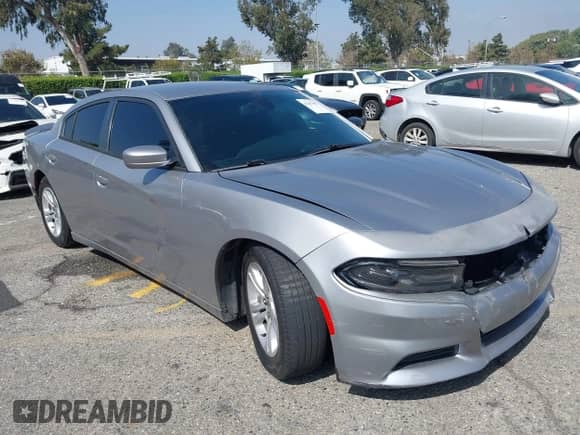 2015 Dodge Charger SE with VIN 2C3CDXBG8FH837060, listed as a IAAI auction lot 43397005 with 102,616 mi miles and . Bid and sale history available at DreamBid. Image 1.
