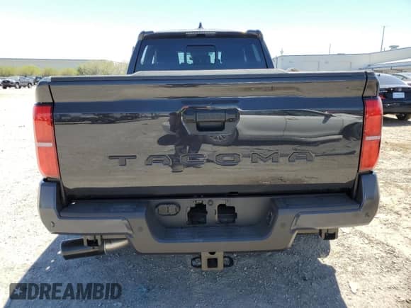2025 Toyota Tacoma SR5 with VIN 3TMLB5FN4SM037253, listed as a Copart auction lot 66145805 with 9,501 mi miles and Salvage title. Bid and sale history available at DreamBid. Image 6.