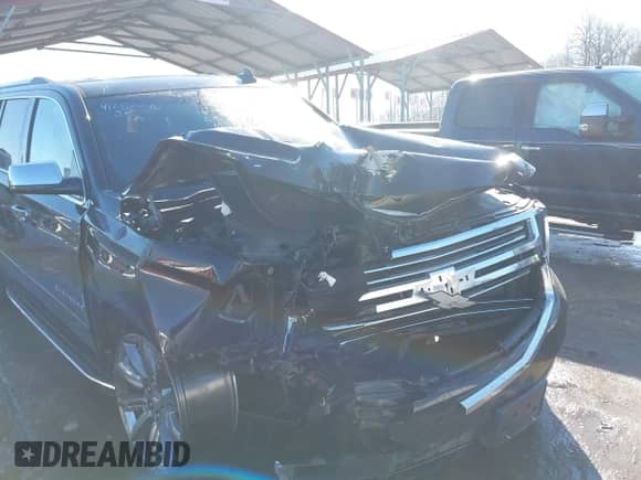 2018 Chevrolet Suburban Premier z VIN 1GNSKJKCXJR134700, wystawiony jako IAAI lot #41282040 z przebiegiem 105 554 mil mil oraz . Historia ofert i sprzedaży dostępna na DreamBid. Obrazek 6.