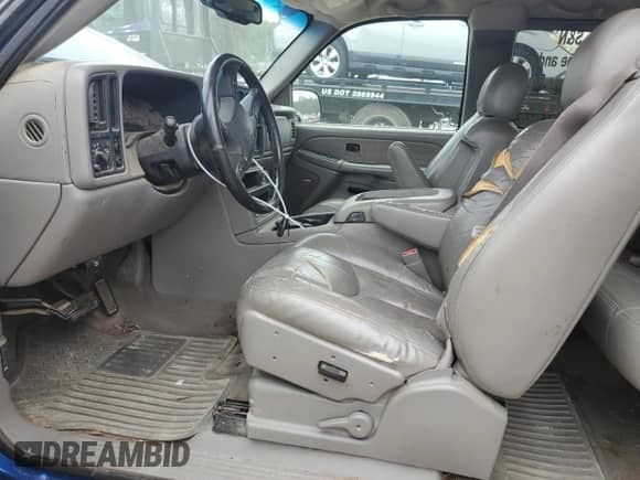 2003 Chevrolet Silverado 1500 LS with VIN 2GCEC19T731169084, listed as a Copart auction lot 66119705 with 180,804 mi miles and Salvage title. Bid and sale history available at DreamBid. Image 7.