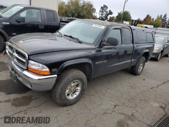 1997 Dodge Dakota с VIN 1B7GG23Y7VS177602, выставлен на аукционе Copart как лот 76836664 с пробегом Не указан миль и Списание • Salvage title. История ставок и продаж доступна на DreamBid. Изображение 1.