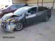 2022 Toyota Prius Nightshade with VIN JTDKAMFU4N3155017, listed as a IAAI auction lot 43013402 with 146,084 mi miles and . Bid and sale history available at DreamBid. Image 18.