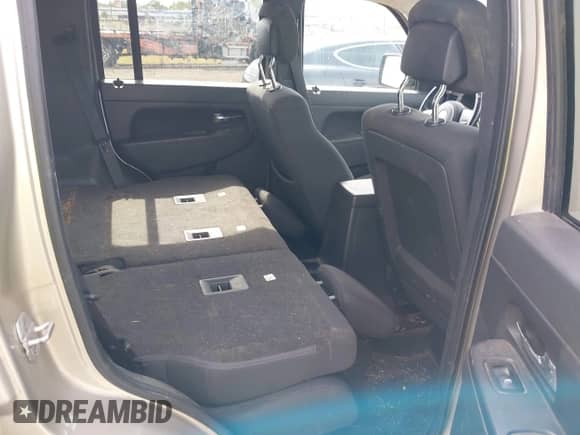 2011 Jeep Liberty Sport with VIN 1J4PN2GK4BW593858, listed as a IAAI auction lot 43331397 with 130,728 mi miles and . Bid and sale history available at DreamBid. Image 8.