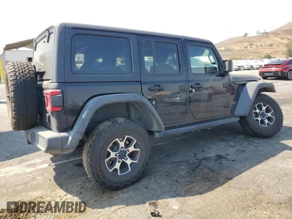 2021 Jeep Wrangler Unlimited Rubicon with VIN 1C4HJXFG1MW649077, listed as a Copart auction lot 68678235 with 52,136 mi miles and Salvage title. Bid and sale history available at DreamBid. Image 3.