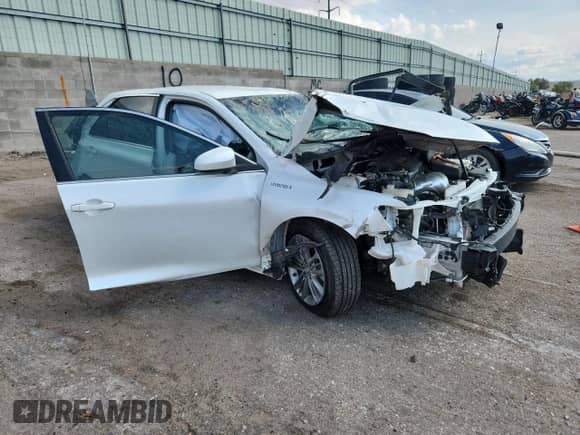 2015 Toyota Camry LE с VIN 4T1BD1FK1FU175186, выставлен на аукционе Copart как лот 69825435 с пробегом Не указан миль и Списание • Salvage title. История ставок и продаж доступна на DreamBid. Изображение 4.