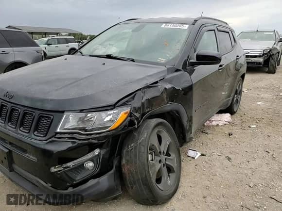 2019 Jeep Compass Altitude with VIN 3C4NJCBB2KT706637, listed as a Copart auction lot 86140265 with 161,415 mi miles and Salvage title. Bid and sale history available at DreamBid. Image 14.
