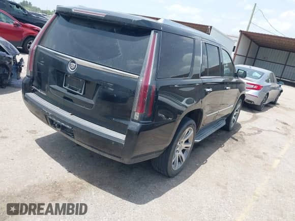 2015 Cadillac Escalade Luxury with VIN 1GYS3BKJ6FR187602, listed as a IAAI auction lot 42648552 with 164,759 mi miles and . Bid and sale history available at DreamBid. Image 4.