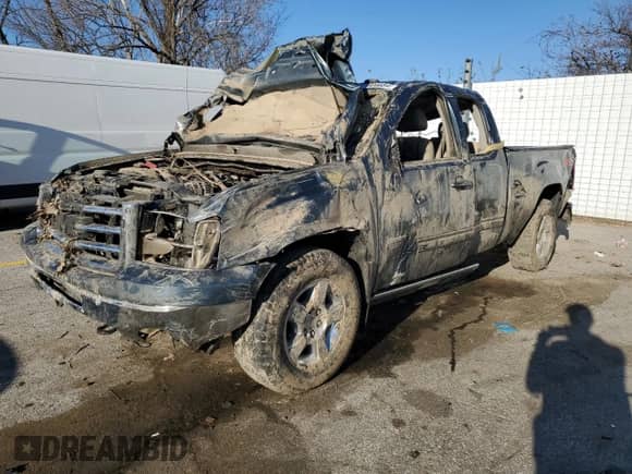 2012 GMC Sierra 1500 SLT with VIN 1GTR2WE70CZ284367, listed as a Copart auction lot 82809684 with Not provided miles and Salvage title. Bid and sale history available at DreamBid. Image 1.