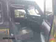 2021 Jeep Wrangler Unlimited 80th Anniversary with VIN 1C4HJXDG6MW662281, listed as a IAAI auction lot 43194178 with 52,603 mi miles and . Bid and sale history available at DreamBid. Image 5.