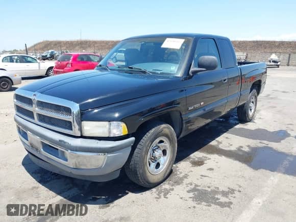 1998 Dodge 1500 with VIN 1B7HC13Y6WJ153289, listed as a IAAI auction lot 42640582 with 208,445 mi miles and . Bid and sale history available at DreamBid. Image 2.