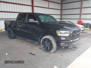 2023 Ram 1500 Laramie z VIN 1C6SRFJT6PN502381, wystawiony jako IAAI lot #42646452 z przebiegiem 40 196 mil mil oraz . Historia ofert i sprzedaży dostępna na DreamBid. Obrazek 1.