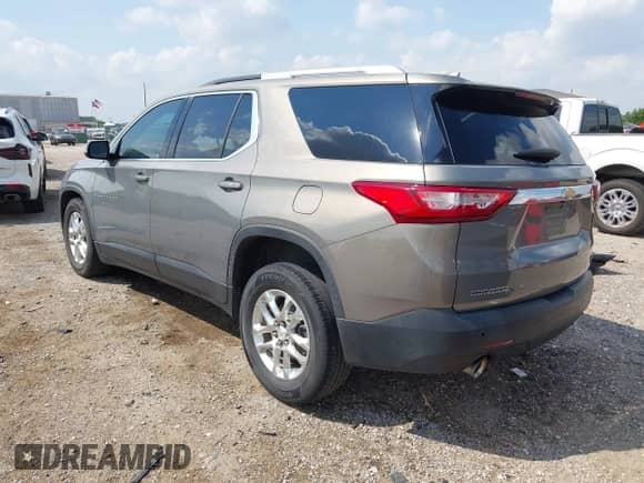 2018 Chevrolet Traverse LT Cloth z VIN 1GNERGKW1JJ107311, wystawiony jako IAAI lot #43045087 z przebiegiem 91 410 mil mil oraz . Historia ofert i sprzedaży dostępna na DreamBid. Obrazek 3.