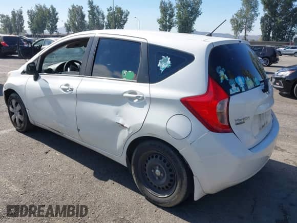 2014 Nissan Note SV z VIN 3N1CE2CP1EL427364, wystawiony jako IAAI lot #42678715 z przebiegiem 106 850 mil mil oraz . Historia ofert i sprzedaży dostępna na DreamBid. Obrazek 3.