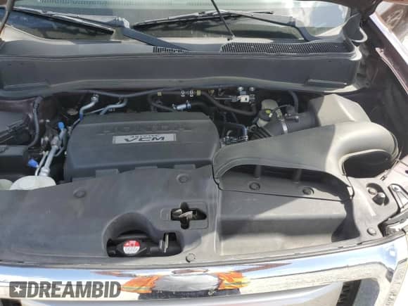 2010 Honda Pilot Touring with VIN 5FNYF3H90AB002579, listed as a Copart auction lot 49802645 with Not provided miles and Salvage title. Bid and sale history available at DreamBid. Image 12.