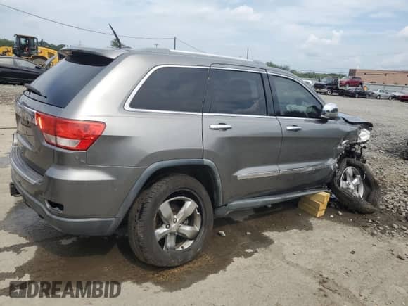 2011 Jeep Grand Cherokee Overland with VIN 1J4RR6GT6BC719085, listed as a Copart auction lot 69018255 with Not provided miles and Salvage title. Bid and sale history available at DreamBid. Image 3.