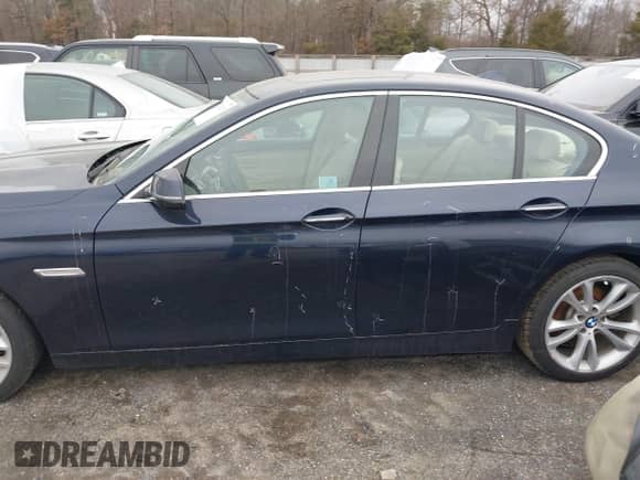 2014 BMW 5 Series 535d xDrive with VIN WBAFV3C51ED684090, listed as a IAAI auction lot 41523119 with 119,877 mi miles and . Bid and sale history available at DreamBid. Image 14.