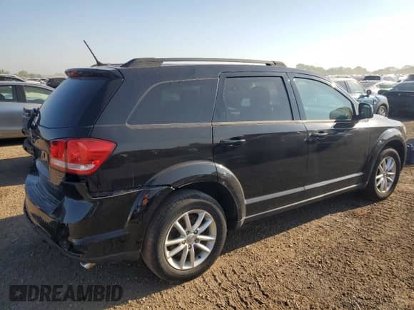 2014 Dodge Journey SXT with VIN 3C4PDDBG9ET181890, listed as a Copart auction lot 80855335 with 101,492 mi miles and Salvage title. Bid and sale history available at DreamBid. Image 3.