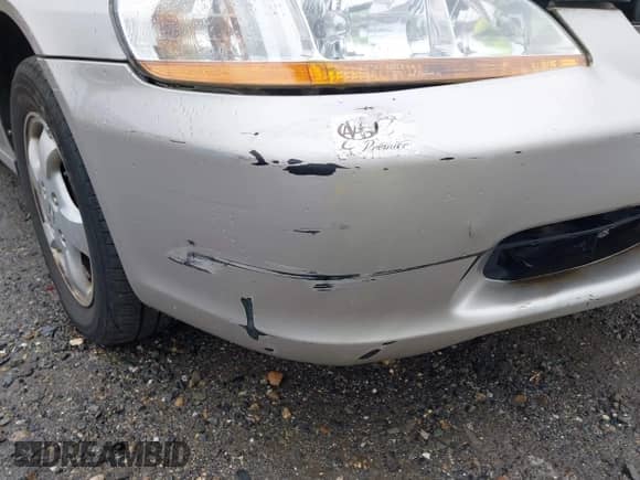 1998 Honda Accord EX z VIN 1HGCG6677WA023666, wystawiony jako IAAI lot #42434534 z przebiegiem 238 140 mil mil oraz . Historia ofert i sprzedaży dostępna na DreamBid. Obrazek 13.