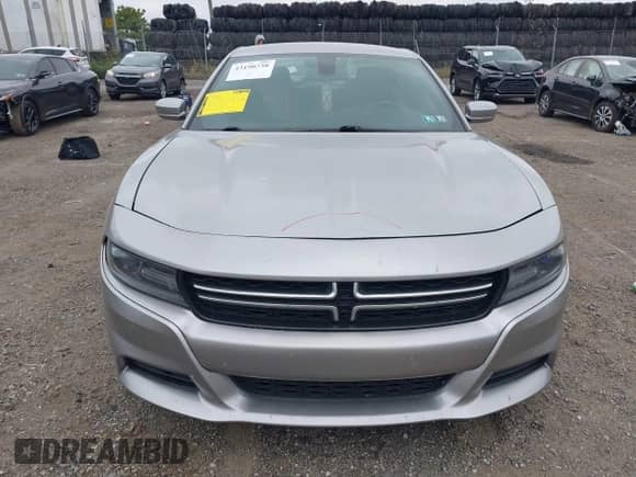 2015 Dodge Charger SE z VIN 2C3CDXBG7FH716892, wystawiony jako IAAI lot #43190738 z przebiegiem 116 613 mil mil oraz . Historia ofert i sprzedaży dostępna na DreamBid. Obrazek 12.