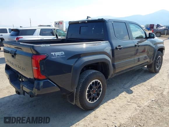 2024 Toyota Tacoma TRD Off Road with VIN 3TMLB5JN7RM069938, listed as a IAAI auction lot 43056789 with 6,837 mi miles and . Bid and sale history available at DreamBid. Image 4.