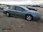 2005 Chevrolet Impala LS with VIN 2G1WH52K559272404, listed as a Copart auction lot 85717255 with 211,236 mi miles and Salvage title. Bid and sale history available at DreamBid. Image 4.