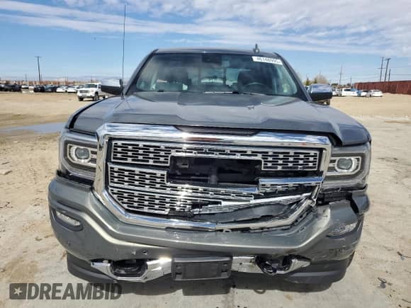 2018 GMC Sierra 1500 Denali с VIN 3GTP1PEC2JG569761, выставлен на аукционе Copart как лот 46148995 с пробегом 33 196 миль миль и Списание • Salvage title. История ставок и продаж доступна на DreamBid. Изображение 5.