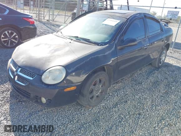 2004 Dodge Neon SXT with VIN 1B3ES56C34D620243, listed as a IAAI auction lot 43104959 with 223,134 mi miles and . Bid and sale history available at DreamBid. Image 2.