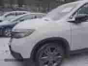 2019 Honda Passport EX-L with VIN 5FNYF8H53KB029769, listed as a IAAI auction lot 41311354 with 41,070 mi miles and . Bid and sale history available at DreamBid. Image 19.