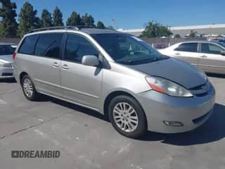 2007 Toyota Sienna XLE z VIN 5TDZK22C47S052078, wystawiony jako IAAI lot #42336003 z przebiegiem 237 023 mil mil oraz . Historia ofert i sprzedaży dostępna na DreamBid. Obrazek 1.