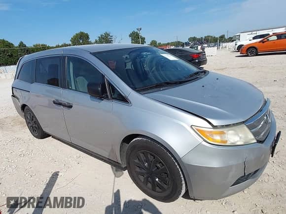 2011 Honda Odyssey LX with VIN 5FNRL5H2XBB028555, listed as a IAAI auction lot 43194763 with 164,504 mi miles and . Bid and sale history available at DreamBid. Image 1.