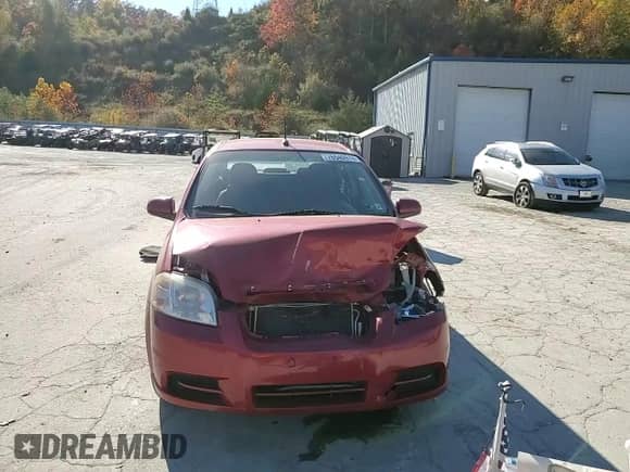 2011 Chevrolet Aveo 1LT with VIN KL1TD5DE6BB204921, listed as a Copart auction lot 76540974 with 71,165 mi miles and Salvage title. Bid and sale history available at DreamBid. Image 11.