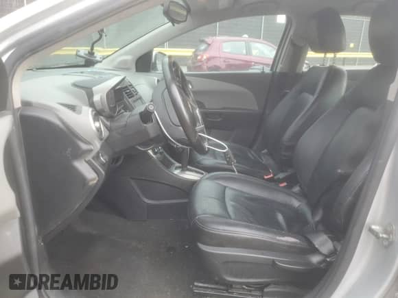2014 Chevrolet Sonic LTZ with VIN 1G1JE5SB4E4201684, listed as a Copart auction lot 43089345 with 161,948 mi miles and Salvage title. Bid and sale history available at DreamBid. Image 7.