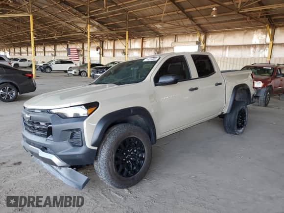 2023 Chevrolet Colorado 4WD Trail Boss z VIN 1GCPTEEK5P1127327, wystawiony jako Copart lot #71821455 z przebiegiem 41 238 mil mil oraz Szkoda całkowita • Salvage title. Historia ofert i sprzedaży dostępna na DreamBid. Obrazek 1.