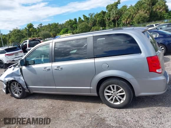 2019 Dodge Grand Caravan SXT with VIN 2C4RDGCG7KR761789, listed as a IAAI auction lot 43333914 with 144,794 mi miles and . Bid and sale history available at DreamBid. Image 14.