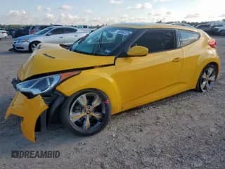 2012 Hyundai Veloster w/Black Int z VIN KMHTC6ADXCU082191, wystawiony jako Copart lot #68662225 z przebiegiem 53 488 mil mil oraz Szkoda całkowita • Salvage title. Historia ofert i sprzedaży dostępna na DreamBid. Obrazek 1.