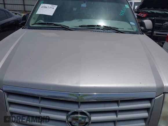 2005 Cadillac Escalade z VIN 1GYEK63N25R248175, wystawiony jako IAAI lot #42867374 z przebiegiem 185 101 mil mil oraz . Historia ofert i sprzedaży dostępna na DreamBid. Obrazek 10.