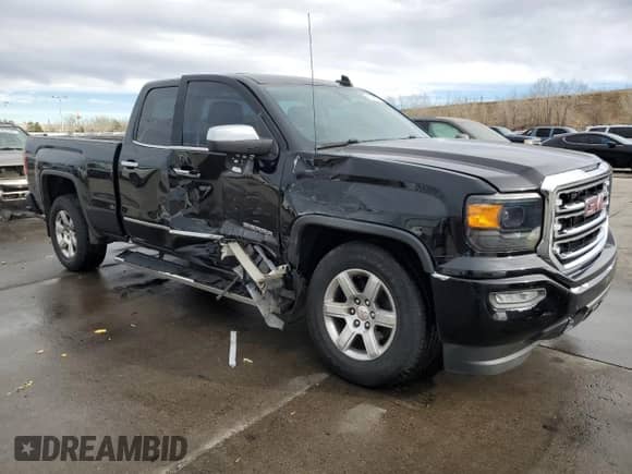 2017 GMC Sierra 1500 SLT z VIN 1GTV2NEJ7HZ348013, wystawiony jako Copart lot #86545954 z przebiegiem 100 463 mil mil oraz Szkoda całkowita • Salvage title. Historia ofert i sprzedaży dostępna na DreamBid. Obrazek 4.