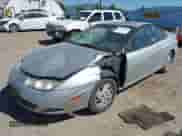 2002 Saturn SC with VIN 1G8ZY12722Z243236, listed as a IAAI auction lot 42464967 with 148,855 mi miles and . Bid and sale history available at DreamBid. Image 2.